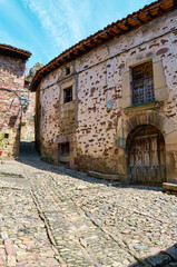 Cobblestone street in the middle of an ancient Spanish village