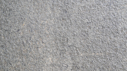 Close up macro view of rough grey stone surface. detailed nature background or pattern texture...
