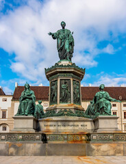 Fototapeta na wymiar Kaiser Franz I monument in the courtyard of Hofburg palace, Vienna, Austria (inscription 