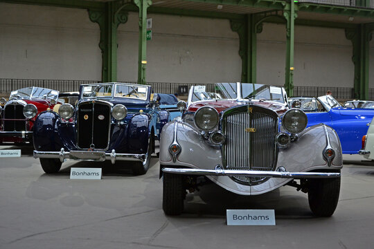 Paris, France - February 4, 2020: Bonhams 2020 sale at the Grand Palais in Paris. Focus on a blue 1937 Maybach SW38 Special Roadster and a gray 1937 Horch 853 Spezialroadster.