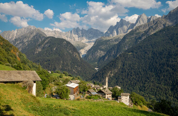 Fototapeta na wymiar The Soglio village and Piz Badile, Pizzo Cengalo, and Sciora peaks in the Bregaglia range - Switzerland.