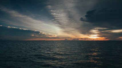 Sunset wallpaper over the sea, in Koh Tao Thailand beautiful dark waves