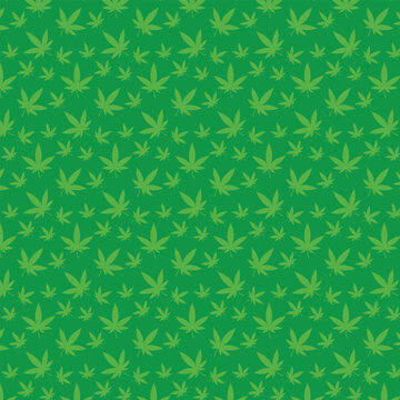 Cannabis leaf pattern on a green color background.