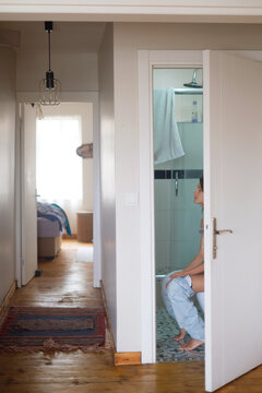 Woman in bathroom morning beauty routine