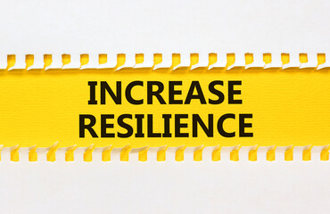 Obraz premium Increase resilience symbol. Concept word Increase resilience typed on yellow and white paper. Beautiful yellow and white background. Business and increase resilience concept. Copy space.