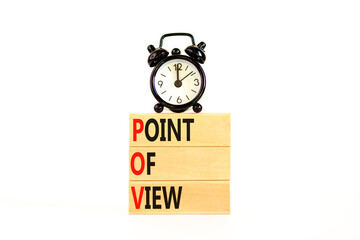 POV point of view symbol. Concept words POV point of view on wooden blocks on a beautiful white table white background. Black alarm clock. Business and POV point of view concept. Copy space.