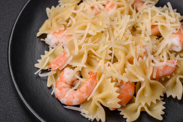 Delicious farfalle pasta with langoustine shrimp with creamy sauce