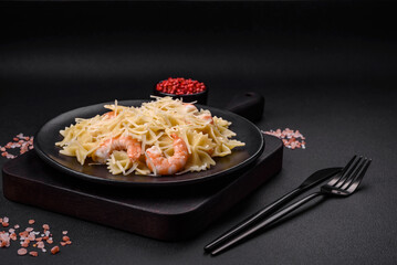 Delicious farfalle pasta with langoustine shrimp with creamy sauce