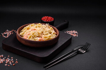 Delicious farfalle pasta with langoustine shrimp with creamy sauce