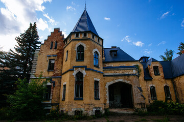 Fototapeta na wymiar Old abandoned castle in gothic style. Former Philipov manor, Former Manor Uspenskoye, Moscow region