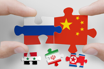 Puzzle made from flags of Russia, China, Syria, Iran and North Korea. Russia and China relations and military collaboration
