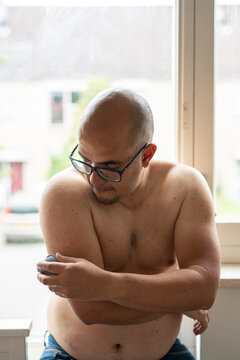 Diabetic man with medical device. 