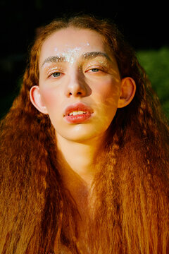 Close Up Portrait Of A Young Woman With Ginger Hair