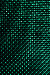 Grid with green background, glow, grid and mesh texture.