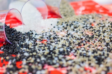 Plastic recycling, renewable resource - heap of secondary polystyrene, polyethylene, polypropylene...