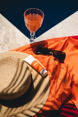 pool glass hat and orange