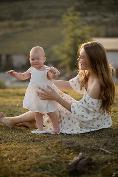 mother spending time with a her little daughter
