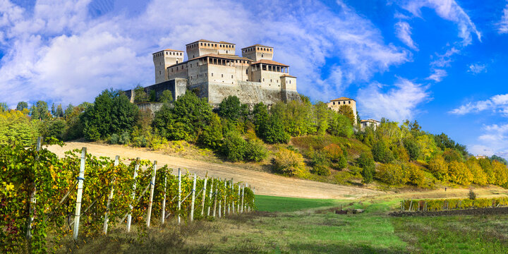 Italy Emilia-Romagna Torrechiara Medieval Castle and Vineyards High Resolution Panorama Autumn Enotourism Destination Traditional Viticulture and Wine Production Italian Countryside Landscape