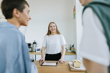 Friends are Choosing items in cafe