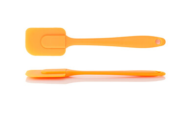 Pastry silicone tools, spatula over white background. Close-up