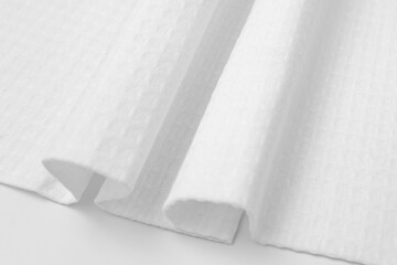 White textured cotton fabrics swatches on light background.Textile Mockup. Towel	