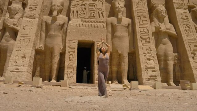 2022 - An interpretive dancer performs outside of the Small Temple of Hathor and Nefertari in Abu Simbel, Egypt.