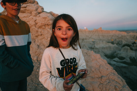 Children in Badlands National Park at sunset