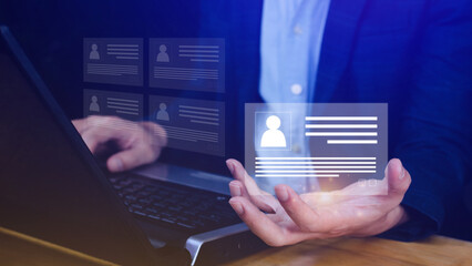 Human resources manager choosing professional profile to hire on virtual screen interface, recruitment concept. Businessman hand pointing icon resource (HR) management concept
