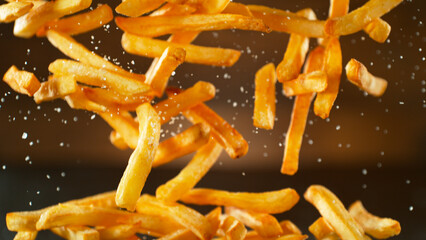 Freeze Motion Shot of Falling Fresh French Fries, Close-up