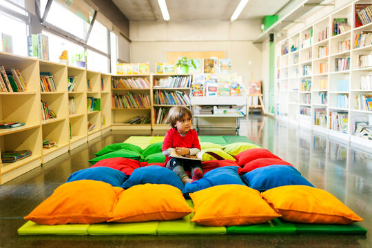 young boy at library