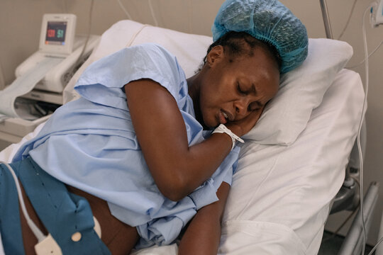 Pregnant female suffering from painful contractions