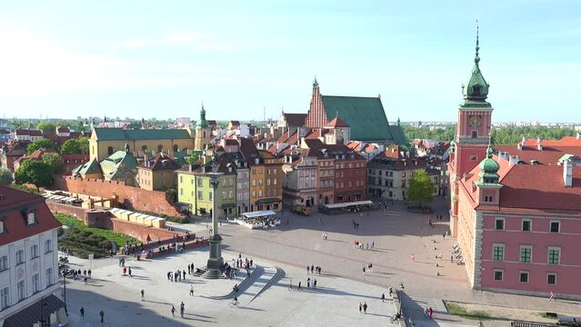 2022 - establishing shot of the old city in Warsaw Poland including open square and church.