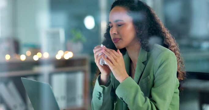 Night, business and woman sneeze, office and burnout with stress, deadline and management. Female employee, entrepreneur and leader blowing nose, depression and health in workplace, sick and allergy