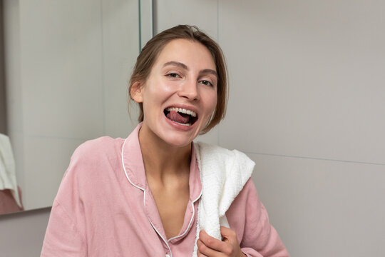 Woman testing dental retainer