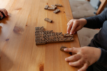 kids playing dominoes