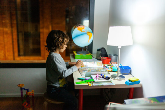  Kid Studying At Night
