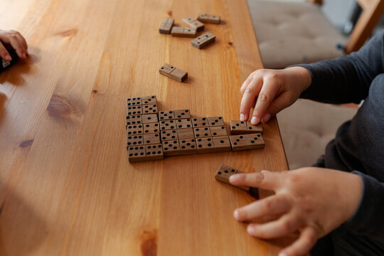kids playing dominoes
