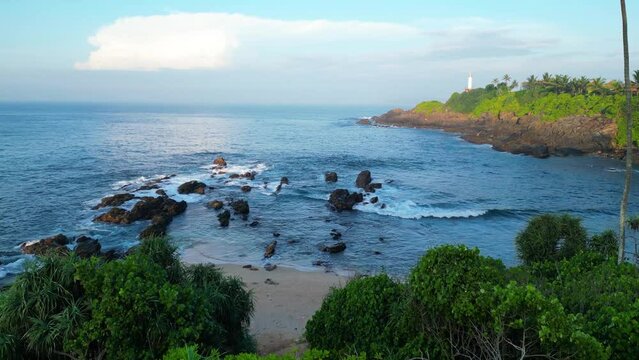 An Aerial Drone Tour of Ocean and Sailing Boat