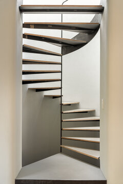 Contemporary interior of country house with round stair