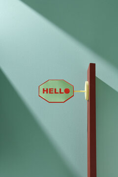 Lightbox with word Hello on wooden shelf, space for text