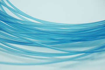 Abstract background, created by a blue transparent wire - 584836533