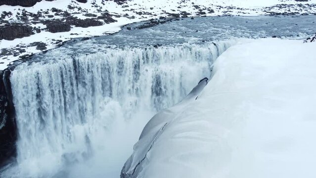 Waterfall Winter Edge Fly Over Landscape Epic Aerial Flight Around Famous Waterfall In Iceland Snow Ice Water Flowing Through High Cliffs Inspiration Epic Scale Nature Adventure