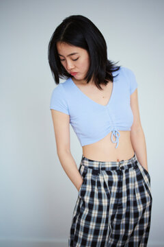 Girl looking at her pyjamas pants.