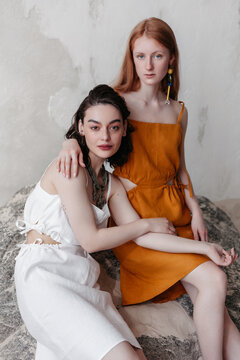 Two Sensual female models in summer dress in studio