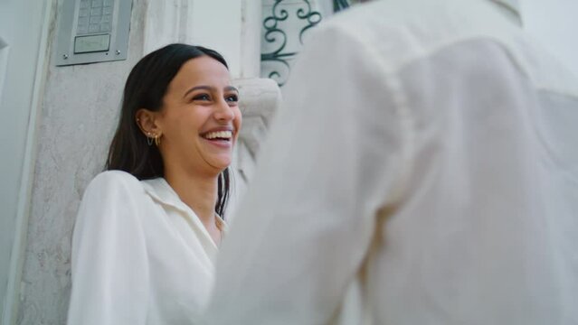 Carefree woman laughing urban place closeup. Affectionate pair flirting on date