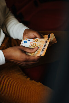 Man Counting Money Bills 
