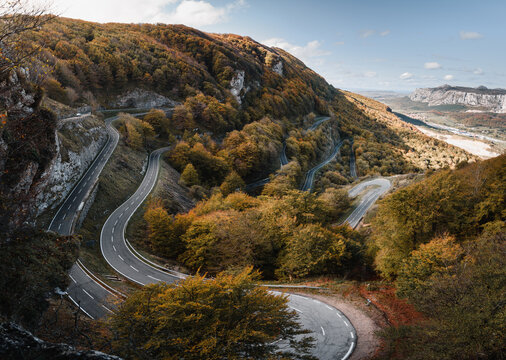 Urbasa mountain pass road curves landscape in autumn.