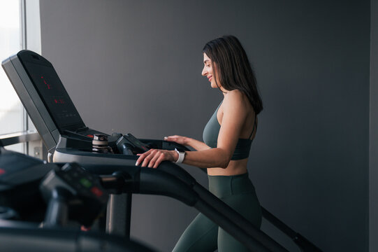 Sportswoman exercising on stair climber