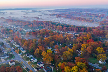 Foggy Sunrise with fall colors