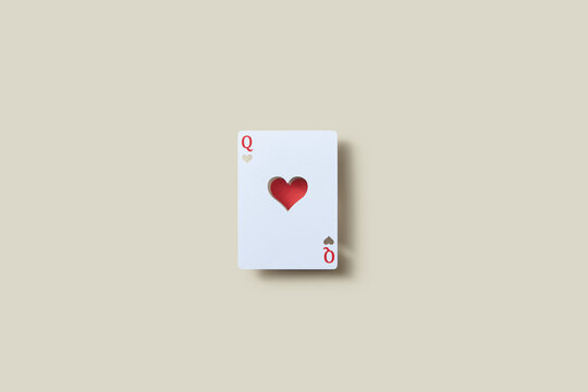 Paper cut white with red ace of heart card.